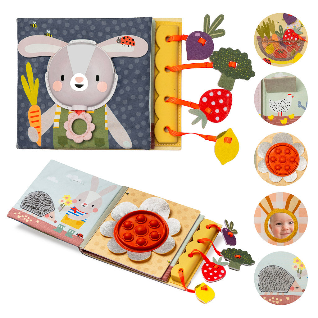 Taf Toys Sensory Garden Busy Book displaying front cover, open pages, pop-it flower, mirror, and hanging felt vegetables